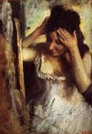 Эдгар Дега - Женщина расчесыват волосы перед зеркалом 1877