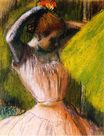 Эдгар Дега - Танцовщица поправляет волосы 1902