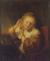 Рембрандт ван Рейн - Молодая женщина примеряет серьги 1654