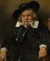 Рембрандт ван Рейн - Портрет пожилого человека, сидящего, возможно, Питера де ла Томба 1667